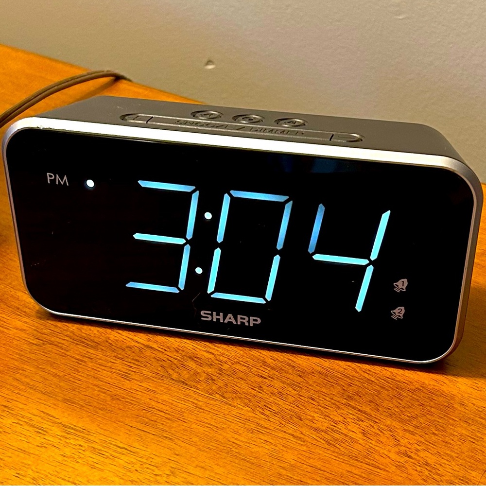 Sharp LED Alarm Clock with 2 alarms, dimmer, and snooze, takes optional AA batt